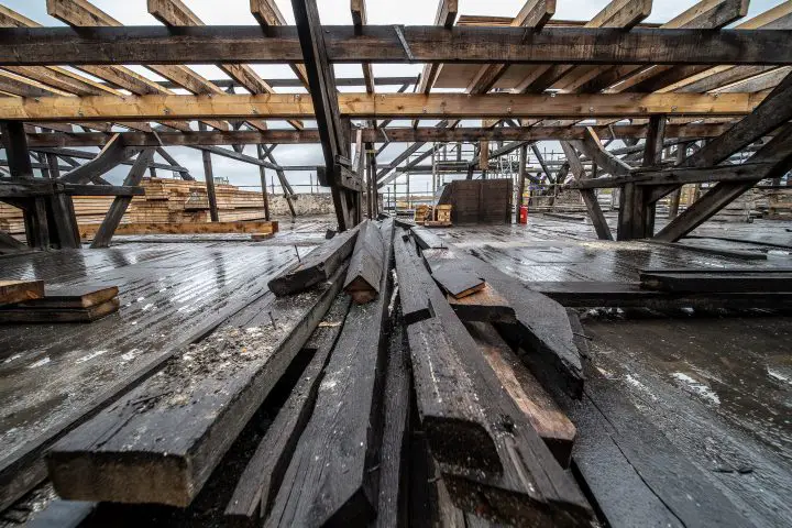 Wood on house construction in rain